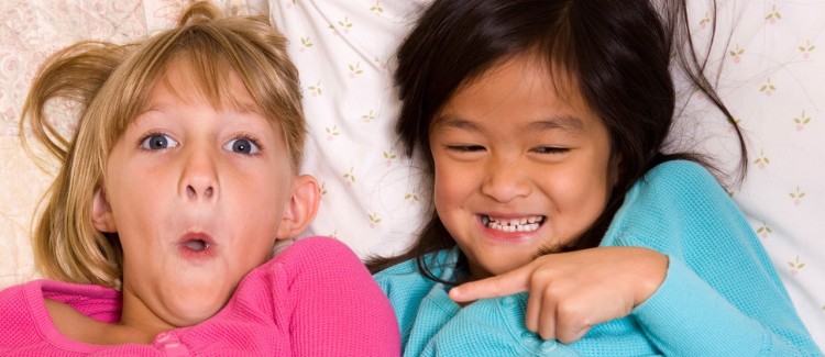 Two young girls at their first sleepover slumber party